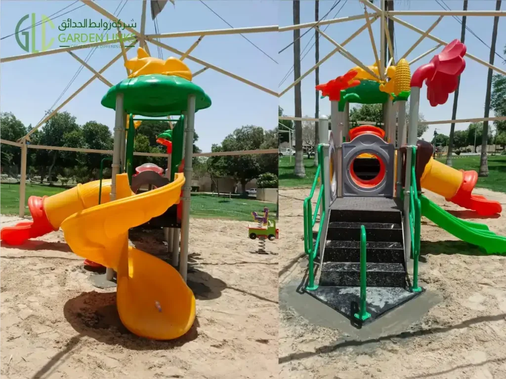 ألعاب خارجية في الخبر، تشمل زحليقة حلزونية صفراء، وزحليقة أنبوبية، وسلالم وصول سوداء، وحواجز أمان خضراء، مع قواعد تثبيت خرسانية.