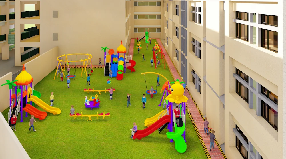 Outdoor playground with slides, swings, seesaws and climbing equipment in a residential compound in Saudi Arabia.