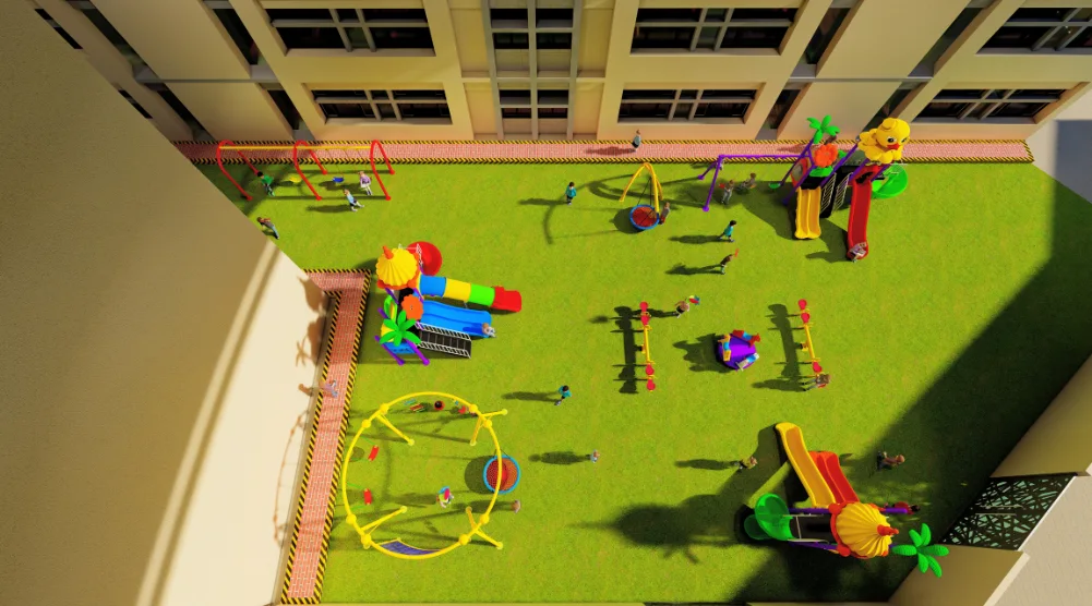 Aerial view of a Saudi school playground with swings, slides, seesaws, climbing equipment, artificial grass, and open play space.