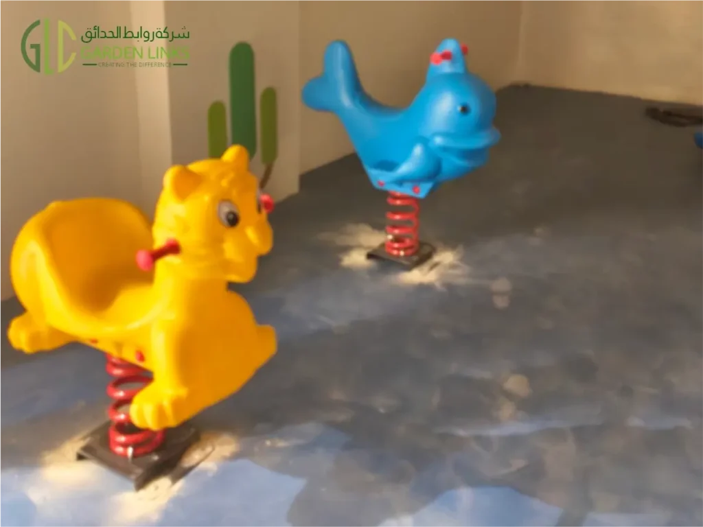 Yellow lion and blue dolphin spring rider playground toys by Garden Links