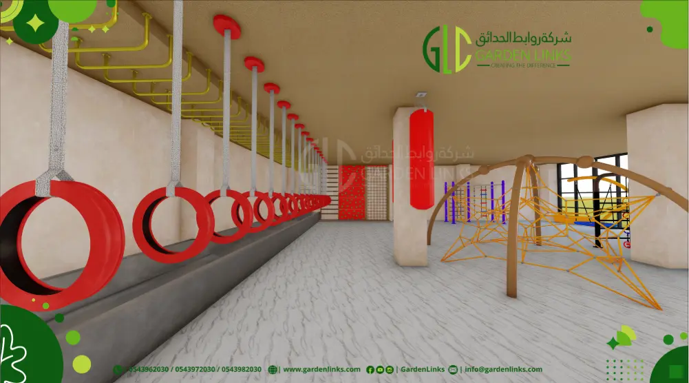 Indoor climbing playground with hanging tire obstacles, overhead bars, punching bags, rope climbing structure and wall-mounted activities