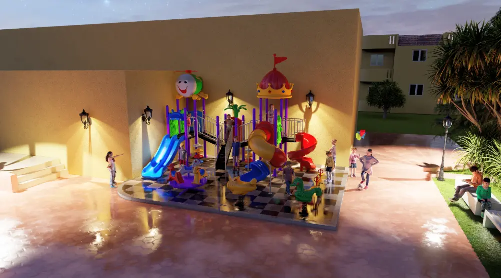Wide evening view of a compact playground with slides, climbing activities and spring riders