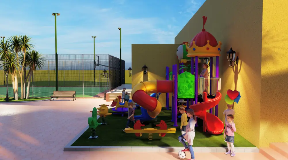 Side view of residential playground with artificial grass, spiral slide and themed play tower