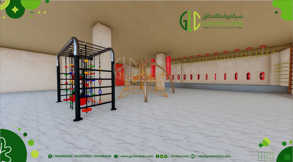 Wide view of an indoor rope course with a metal climbing frame, rope pyramid, hanging tire obstacles, climbing walls and basket swing