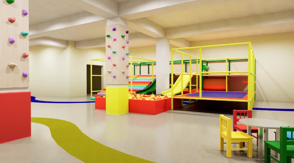 Indoor soft-play area with colorful roller steps, children’s slides, ball pit, padded platforms and climbing holds