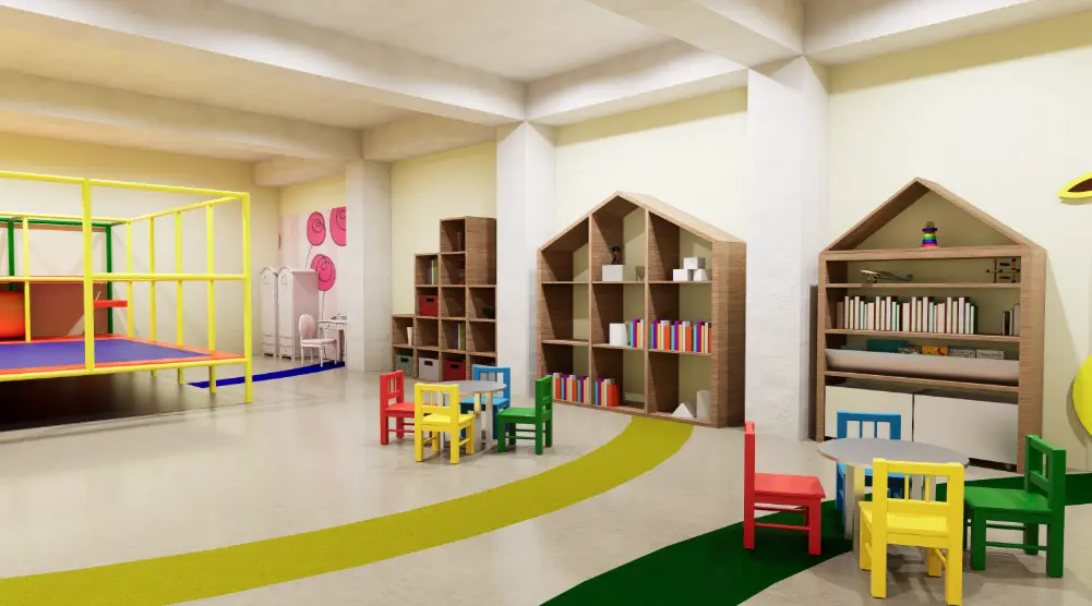 Indoor children’s area with house-shaped bookshelves, colorful tables and chairs, storage units and nearby soft-play equipment