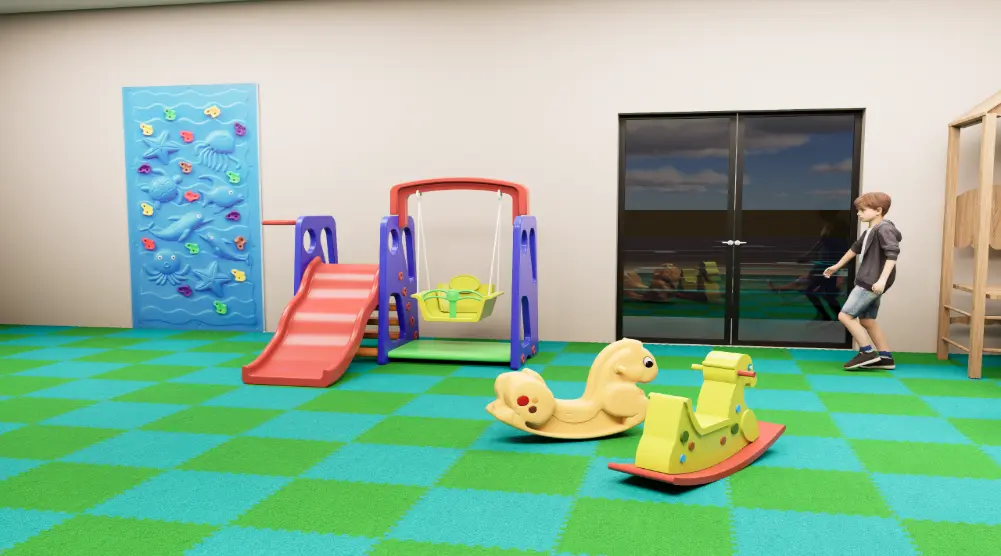 3D indoor playground with a toddler slide and swing set, animal rockers, climbing wall and foam safety flooring
