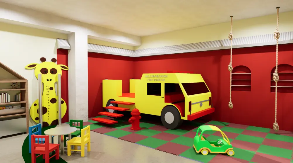 Children’s indoor role-play area with a fire rescue vehicle, fire hydrant, climbing ropes, toy car and foam safety flooring
