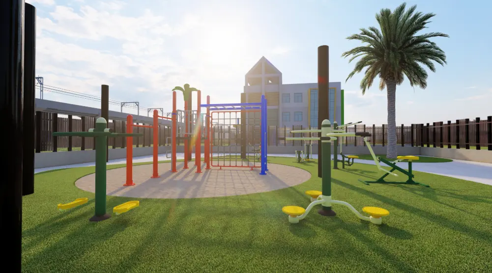 Ground-level view of outdoor gym equipment and central calisthenics structure