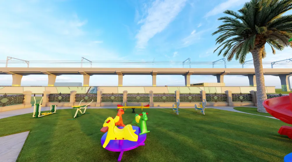 Landscaped community playground with carousel, seesaws, spring riders and fitness equipment
