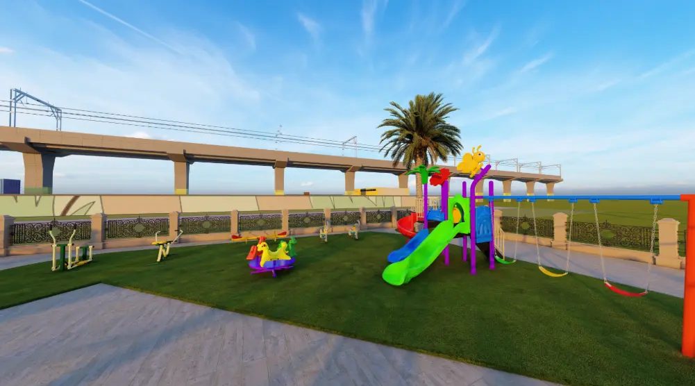 Side view of community playground with multi-play tower, slides, swings and carousel