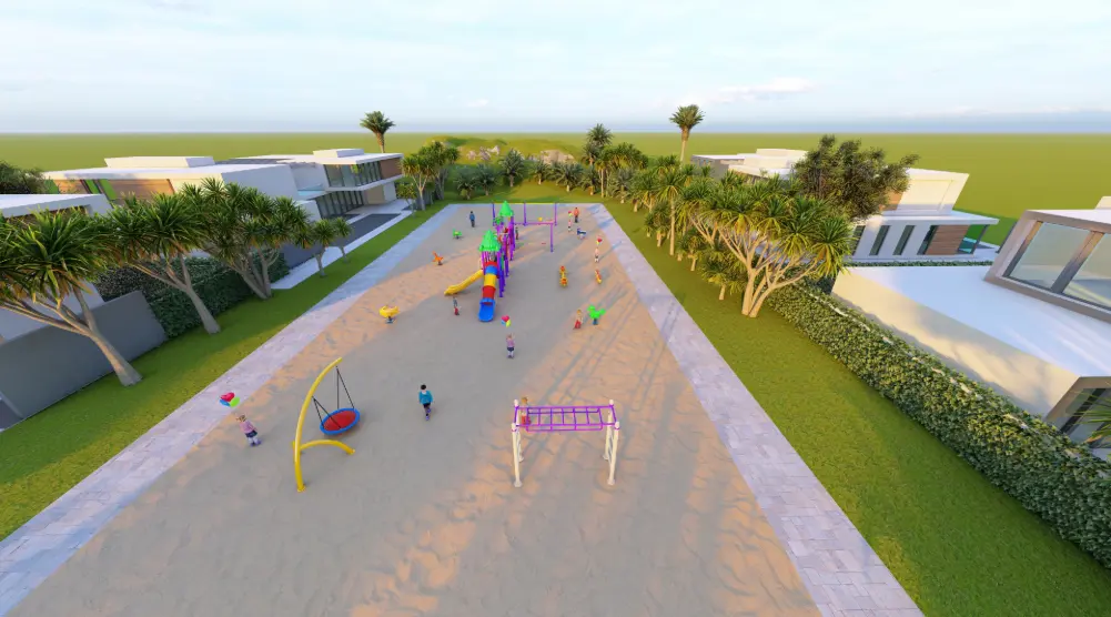 Aerial view along a rectangular playground with climbing bars, slides, swings and surrounding paths