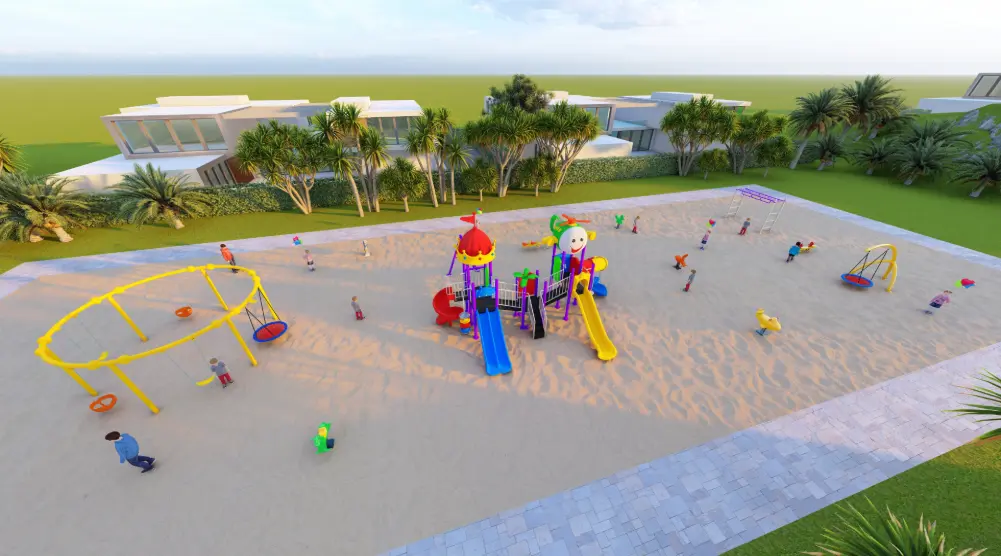 Elevated view of a playground with themed towers, blue and yellow slides and a circular yellow frame