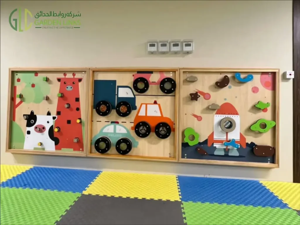 Three wooden wall-mounted activity panels with animal designs, vehicles and interactive learning elements.