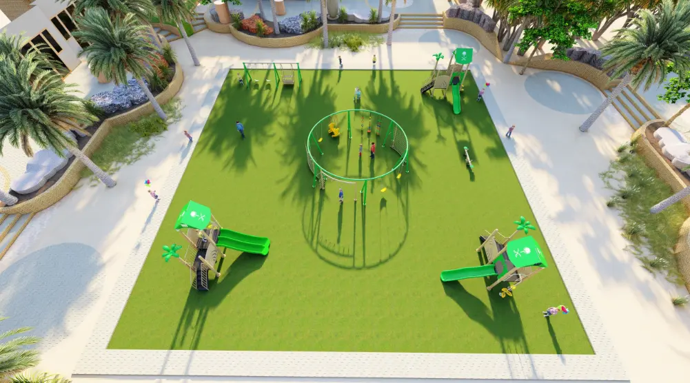Elevated view of a play park with a central circular frame, three green-slide play towers and a separate swing set