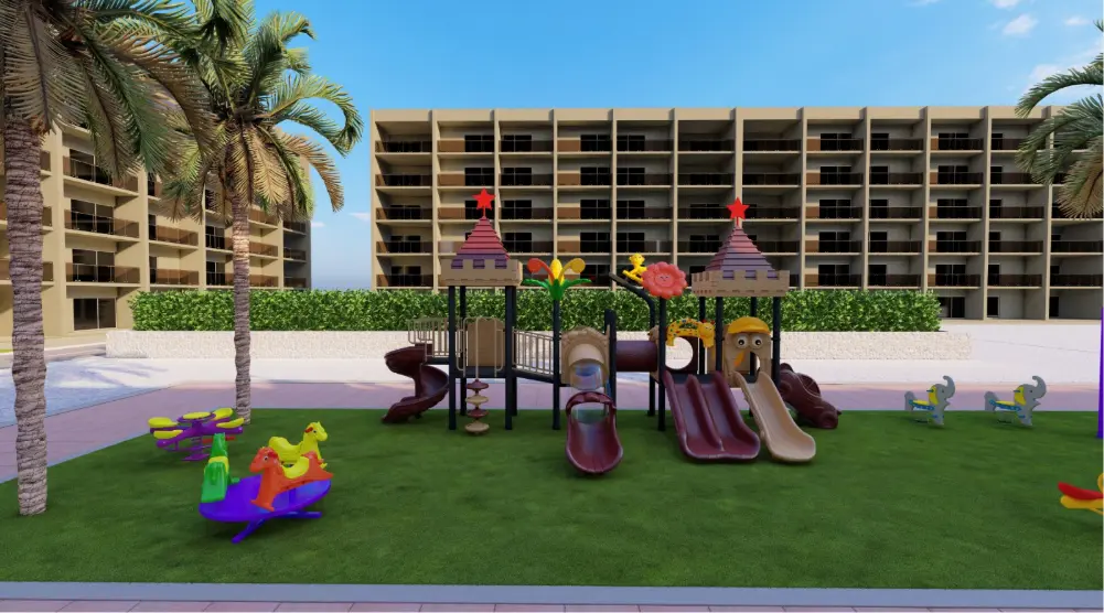 Front view of twin play towers with several slides and colorful rotating play units in a residential courtyard