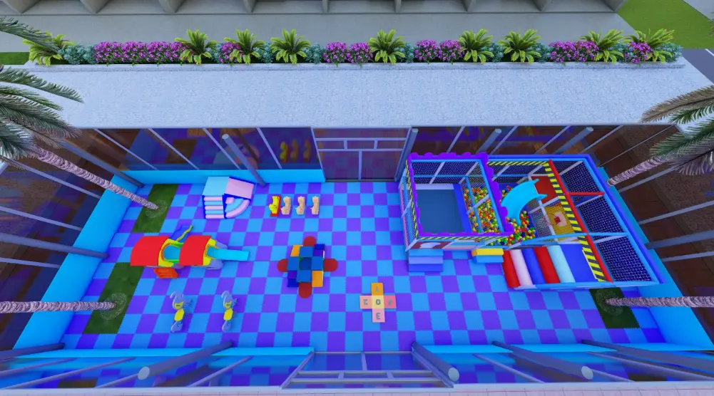 Elevated view of a courtyard soft play area with checkerboard flooring, playhouses, slides and a netted ball pit zone