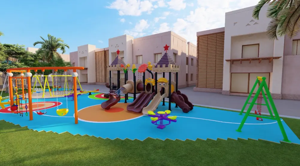 Wide view of a residential play area with castle towers, slides, an orange climbing frame and a green swing set
