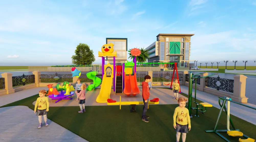 Wide front view of outdoor playground with slides, carousel, swings and fitness stations