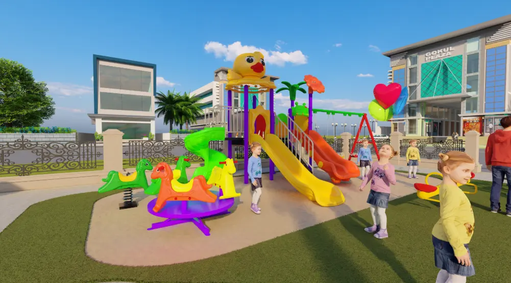 Children’s playground with play tower, double slides, carousel and spring riders